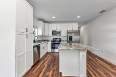 Brand new duplexes MOVE IN READY! Each Unit contains 2 bedrooms on Twin Isles Country Club in Florida - for sale on GolfHomes.com, golf home, golf lot