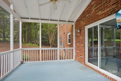 Full-brick, two-story home located on the 13th hole of one of on Raintree Country Club in North Carolina - for sale on GolfHomes.com, golf home, golf lot