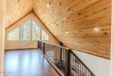Tucked away in the serene heart of the Lake Wallenpaupack region on Paupack Hills Golf and Country Club in Pennsylvania - for sale on GolfHomes.com, golf home, golf lot