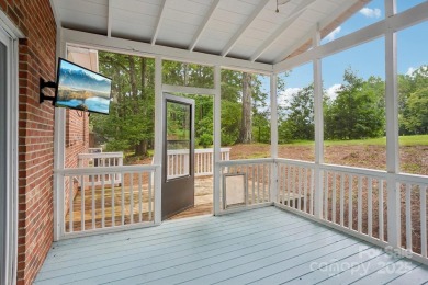 Full-brick, two-story home located on the 13th hole of one of on Raintree Country Club in North Carolina - for sale on GolfHomes.com, golf home, golf lot