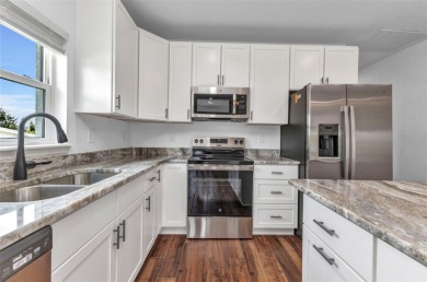 Brand new duplexes MOVE IN READY! Each Unit contains 2 bedrooms on Twin Isles Country Club in Florida - for sale on GolfHomes.com, golf home, golf lot