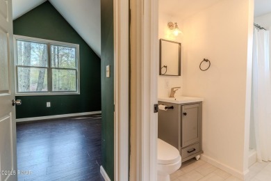 Tucked away in the serene heart of the Lake Wallenpaupack region on Paupack Hills Golf and Country Club in Pennsylvania - for sale on GolfHomes.com, golf home, golf lot