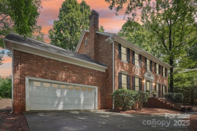 Full-brick, two-story home located on the 13th hole of one of on Raintree Country Club in North Carolina - for sale on GolfHomes.com, golf home, golf lot
