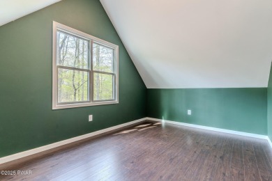 Tucked away in the serene heart of the Lake Wallenpaupack region on Paupack Hills Golf and Country Club in Pennsylvania - for sale on GolfHomes.com, golf home, golf lot