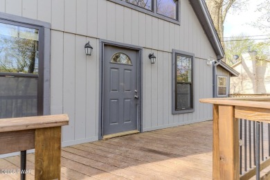 Tucked away in the serene heart of the Lake Wallenpaupack region on Paupack Hills Golf and Country Club in Pennsylvania - for sale on GolfHomes.com, golf home, golf lot