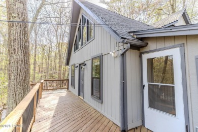 Tucked away in the serene heart of the Lake Wallenpaupack region on Paupack Hills Golf and Country Club in Pennsylvania - for sale on GolfHomes.com, golf home, golf lot