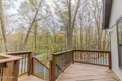 Tucked away in the serene heart of the Lake Wallenpaupack region on Paupack Hills Golf and Country Club in Pennsylvania - for sale on GolfHomes.com, golf home, golf lot