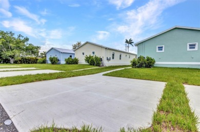 Brand new duplexes MOVE IN READY! Each Unit contains 2 bedrooms on Twin Isles Country Club in Florida - for sale on GolfHomes.com, golf home, golf lot