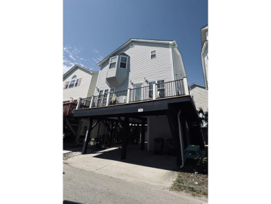 This spacious 4 LARGE Bedroom 4 Bath raised beach house is just on Prestwick Country Club in South Carolina - for sale on GolfHomes.com, golf home, golf lot