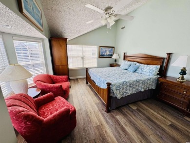 This spacious 4 LARGE Bedroom 4 Bath raised beach house is just on Prestwick Country Club in South Carolina - for sale on GolfHomes.com, golf home, golf lot