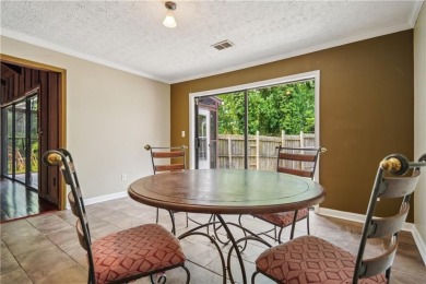 This charming Mid-Century home in Lithonia's Saddlewood on Mystery Valley Golf Course in Georgia - for sale on GolfHomes.com, golf home, golf lot