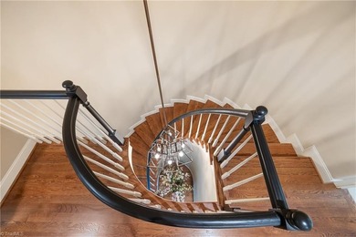 Enjoy luxury living in Creswell Manor, a gated townhome on Grandover Resort in North Carolina - for sale on GolfHomes.com, golf home, golf lot