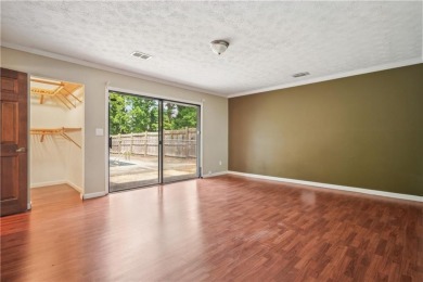 This charming Mid-Century home in Lithonia's Saddlewood on Mystery Valley Golf Course in Georgia - for sale on GolfHomes.com, golf home, golf lot