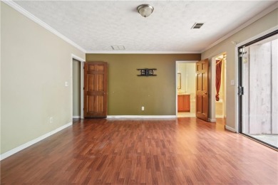 This charming Mid-Century home in Lithonia's Saddlewood on Mystery Valley Golf Course in Georgia - for sale on GolfHomes.com, golf home, golf lot