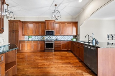 Enjoy luxury living in Creswell Manor, a gated townhome on Grandover Resort in North Carolina - for sale on GolfHomes.com, golf home, golf lot