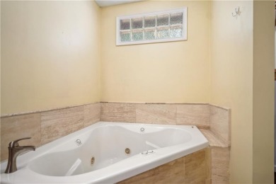 This charming Mid-Century home in Lithonia's Saddlewood on Mystery Valley Golf Course in Georgia - for sale on GolfHomes.com, golf home, golf lot