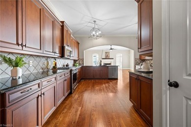 Enjoy luxury living in Creswell Manor, a gated townhome on Grandover Resort in North Carolina - for sale on GolfHomes.com, golf home, golf lot