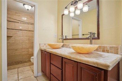 This charming Mid-Century home in Lithonia's Saddlewood on Mystery Valley Golf Course in Georgia - for sale on GolfHomes.com, golf home, golf lot