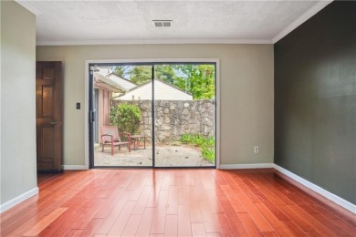 This charming Mid-Century home in Lithonia's Saddlewood on Mystery Valley Golf Course in Georgia - for sale on GolfHomes.com, golf home, golf lot