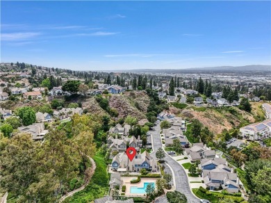 Get ready to fall in love with this breathtaking townhome! on Anaheim Hills Golf Course in California - for sale on GolfHomes.com, golf home, golf lot