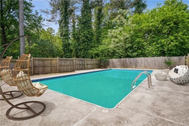This charming Mid-Century home in Lithonia's Saddlewood on Mystery Valley Golf Course in Georgia - for sale on GolfHomes.com, golf home, golf lot