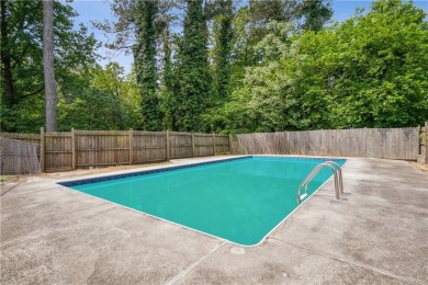 This charming Mid-Century home in Lithonia's Saddlewood on Mystery Valley Golf Course in Georgia - for sale on GolfHomes.com, golf home, golf lot