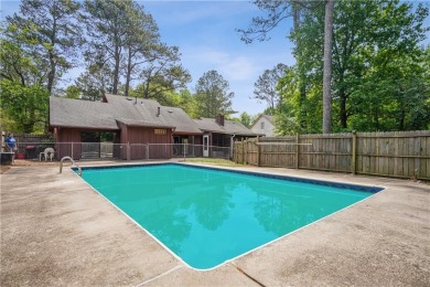 This charming Mid-Century home in Lithonia's Saddlewood on Mystery Valley Golf Course in Georgia - for sale on GolfHomes.com, golf home, golf lot