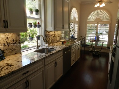 MOST MAGICAL GARDEN  OAKS EAST. AS you stroll thru lovely on Frenchmans Reserve in Florida - for sale on GolfHomes.com, golf home, golf lot