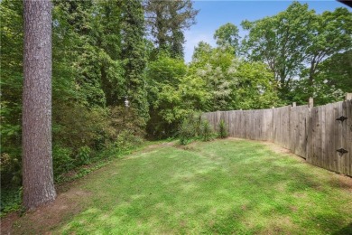 This charming Mid-Century home in Lithonia's Saddlewood on Mystery Valley Golf Course in Georgia - for sale on GolfHomes.com, golf home, golf lot