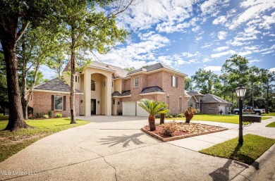 Welcome to your executive four-bedroom grand home located on the on The Oaks Golf Club in Mississippi - for sale on GolfHomes.com, golf home, golf lot