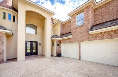 Welcome to your executive four-bedroom grand home located on the on The Oaks Golf Club in Mississippi - for sale on GolfHomes.com, golf home, golf lot