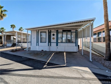 Lovely snowbird park model with a nice family room add on. Great on Riverview Golf Course in Arizona - for sale on GolfHomes.com, golf home, golf lot