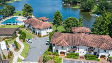 This unique and inviting retreat provides the perfect experience on The Golf Club at Cuscowilla in Georgia - for sale on GolfHomes.com, golf home, golf lot