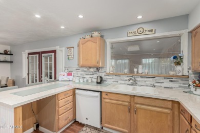 Beautifully maintained home on one of the larger cul-de-sac lots on Fountain of the Sun Country Club in Arizona - for sale on GolfHomes.com, golf home, golf lot