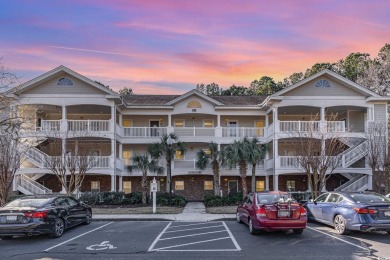 This top floor, fully furnished condo at River Crossing in on Barefoot Resort and Golf Club - Norman Course in South Carolina - for sale on GolfHomes.com, golf home, golf lot