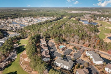 This top floor, fully furnished condo at River Crossing in on Barefoot Resort and Golf Club - Norman Course in South Carolina - for sale on GolfHomes.com, golf home, golf lot