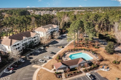 This top floor, fully furnished condo at River Crossing in on Barefoot Resort and Golf Club - Norman Course in South Carolina - for sale on GolfHomes.com, golf home, golf lot