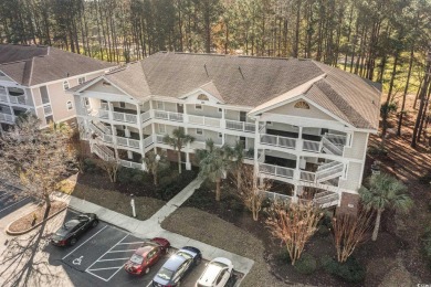 This top floor, fully furnished condo at River Crossing in on Barefoot Resort and Golf Club - Norman Course in South Carolina - for sale on GolfHomes.com, golf home, golf lot