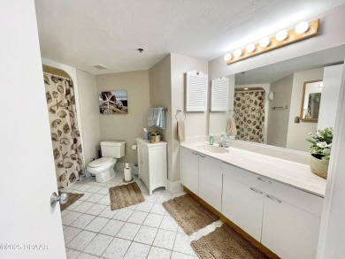 Move-In Ready 2 Bedroom Condo with Stunning River & Ocean Views on Oceans Golf Club in Florida - for sale on GolfHomes.com, golf home, golf lot