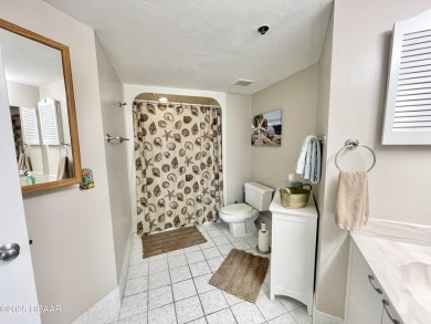 Move-In Ready 2 Bedroom Condo with Stunning River & Ocean Views on Oceans Golf Club in Florida - for sale on GolfHomes.com, golf home, golf lot