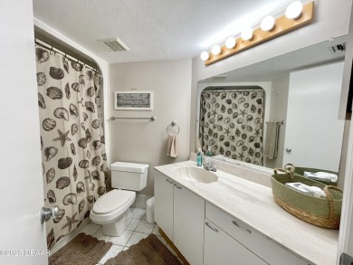Move-In Ready 2 Bedroom Condo with Stunning River & Ocean Views on Oceans Golf Club in Florida - for sale on GolfHomes.com, golf home, golf lot