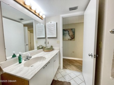Move-In Ready 2 Bedroom Condo with Stunning River & Ocean Views on Oceans Golf Club in Florida - for sale on GolfHomes.com, golf home, golf lot