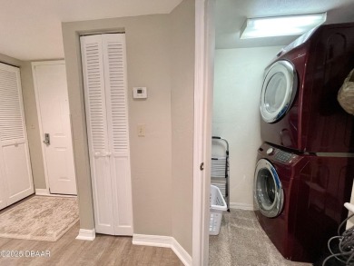 Move-In Ready 2 Bedroom Condo with Stunning River & Ocean Views on Oceans Golf Club in Florida - for sale on GolfHomes.com, golf home, golf lot