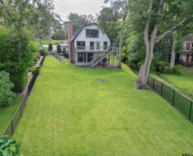 **Lakefront Charm Meets Updated Comfort in Hideaway Lake** on Hide-A-Way Lake Golf Course in Texas - for sale on GolfHomes.com, golf home, golf lot