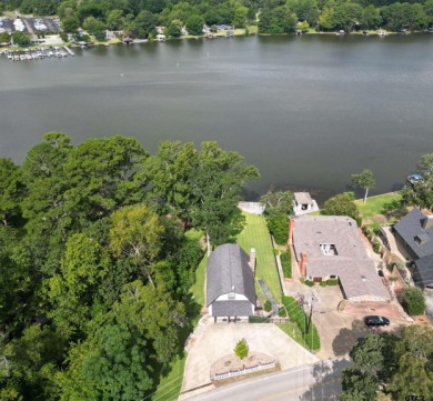 **Lakefront Charm Meets Updated Comfort in Hideaway Lake** on Hide-A-Way Lake Golf Course in Texas - for sale on GolfHomes.com, golf home, golf lot