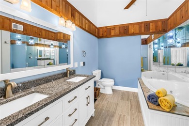 Welcome to coastal living in Treasure Island, a true Norman on Treasure Bay Golf and Tennis in Florida - for sale on GolfHomes.com, golf home, golf lot