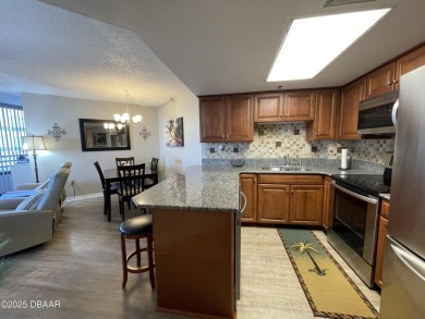 Move-In Ready 2 Bedroom Condo with Stunning River & Ocean Views on Oceans Golf Club in Florida - for sale on GolfHomes.com, golf home, golf lot