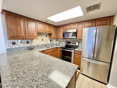 Move-In Ready 2 Bedroom Condo with Stunning River & Ocean Views on Oceans Golf Club in Florida - for sale on GolfHomes.com, golf home, golf lot