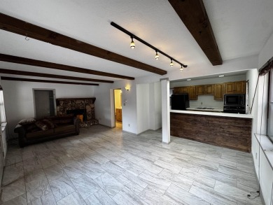 This 2-bedroom, 2-bathroom condo, conveniently located just a on Angel Fire Resort Country Club in New Mexico - for sale on GolfHomes.com, golf home, golf lot