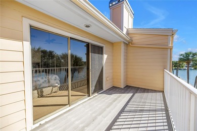 Welcome to coastal living in Treasure Island, a true Norman on Treasure Bay Golf and Tennis in Florida - for sale on GolfHomes.com, golf home, golf lot